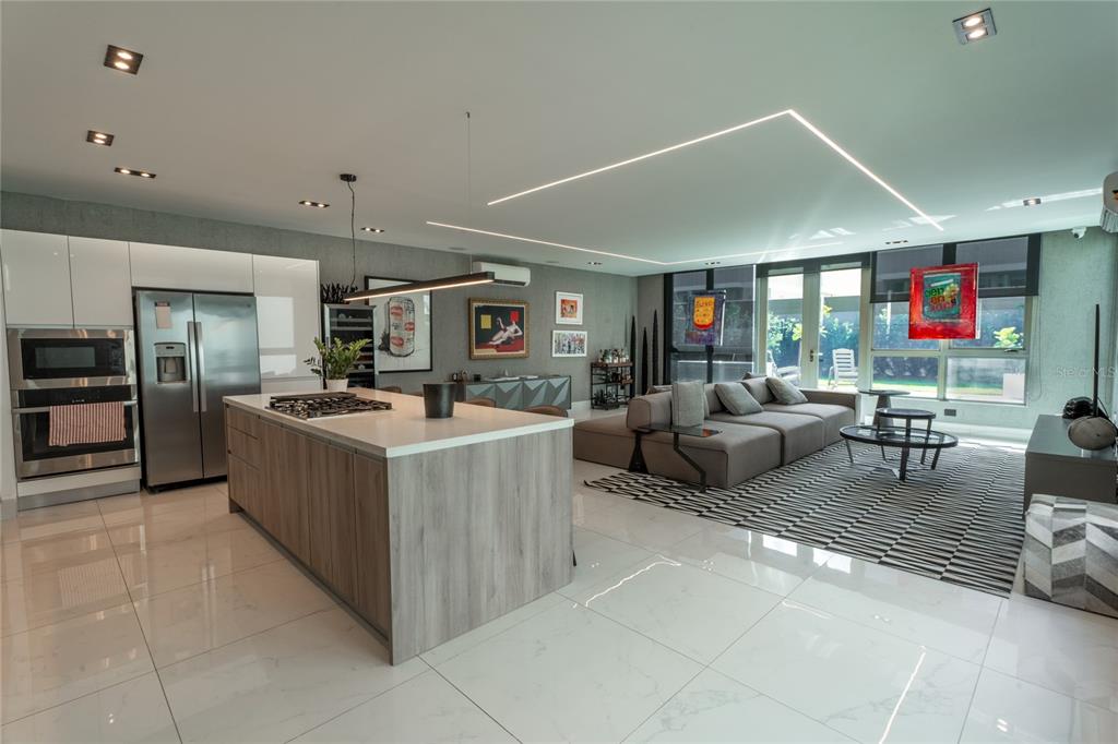 68 Riviera Village Bayamon, PR 00959 - Photo 2 of 14 a living room with furniture and a flat screen tv