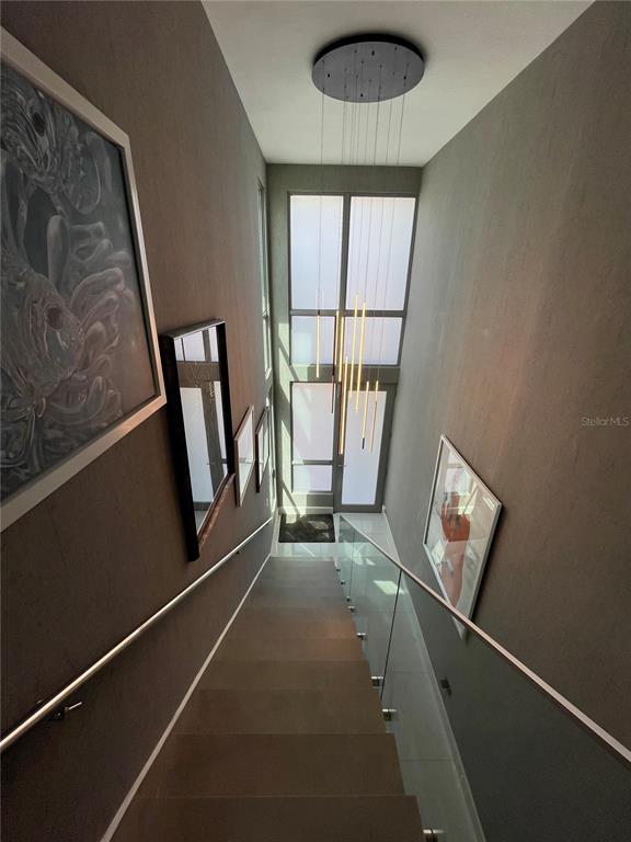 68 Riviera Village Bayamon, PR 00959 - Photo 8 of 14 a view of empty room with wooden floor and fan