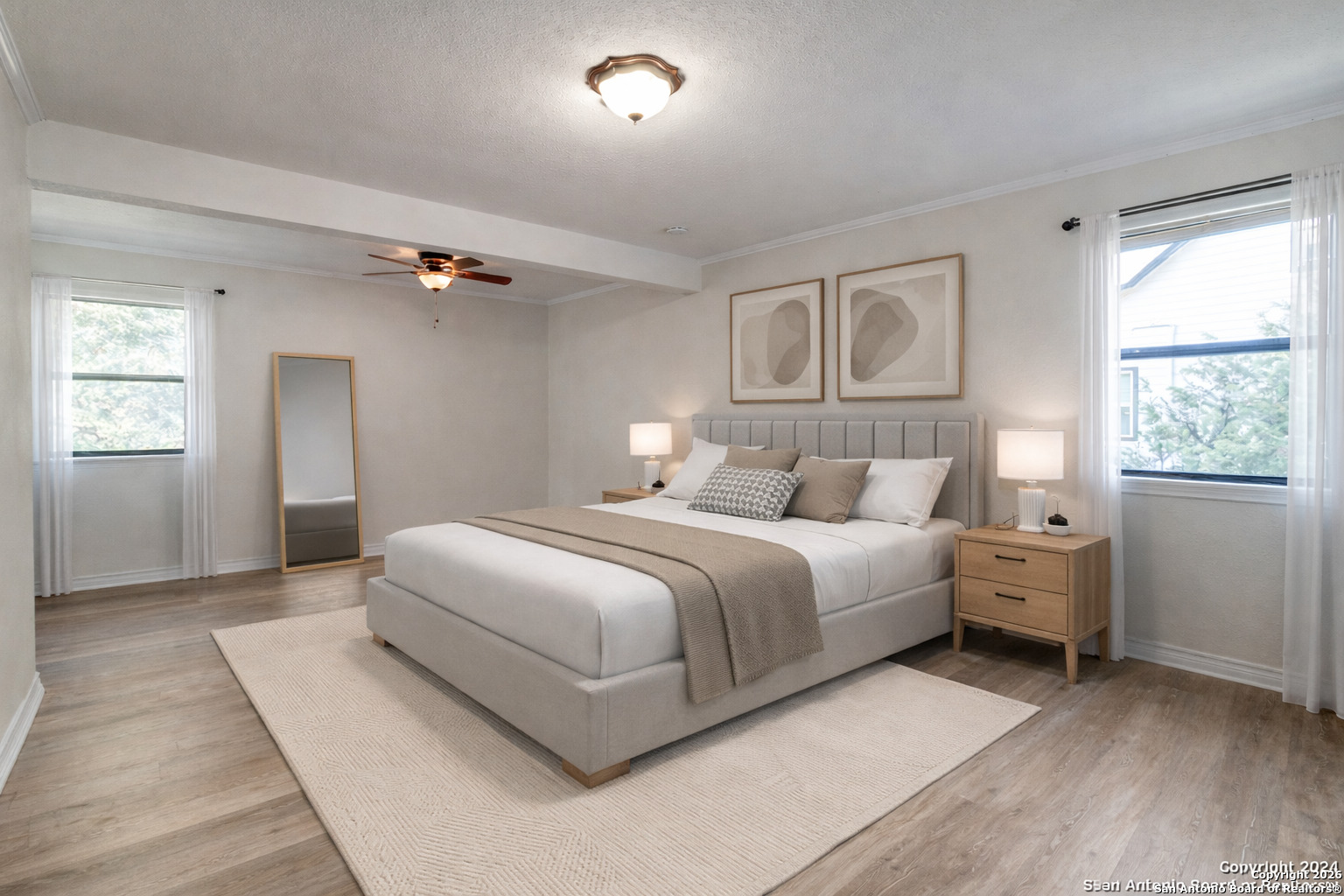 1609 Winding Creek Trail Spring Branch, TX 78070 - Photo 8 of 20 a bedroom with a white bed and three windows