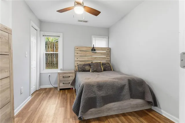 a bathroom with a granite countertop sink a mirror and a