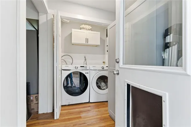 a view of a wooden deck with a bench