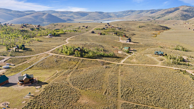 61 Skyline, Unit 61 Helper, UT 84526 - Photo 21 of 31 Expansive hillside property featuring scattered residences, natural landscaping, and distant water body