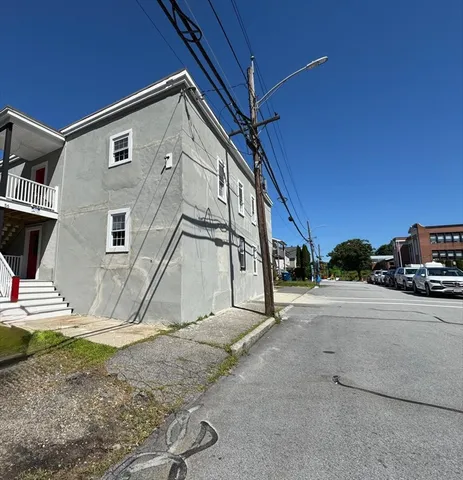 a house with trees in the background