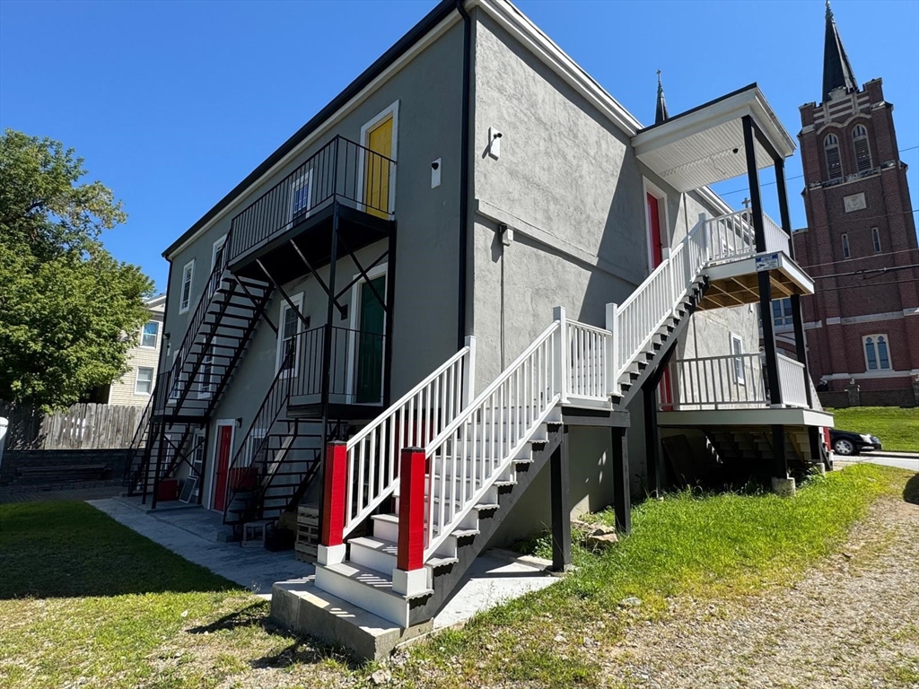 56 Whitcomb Street Webster, MA 01570 - Photo 12 of 18 a view of outdoor space and deck