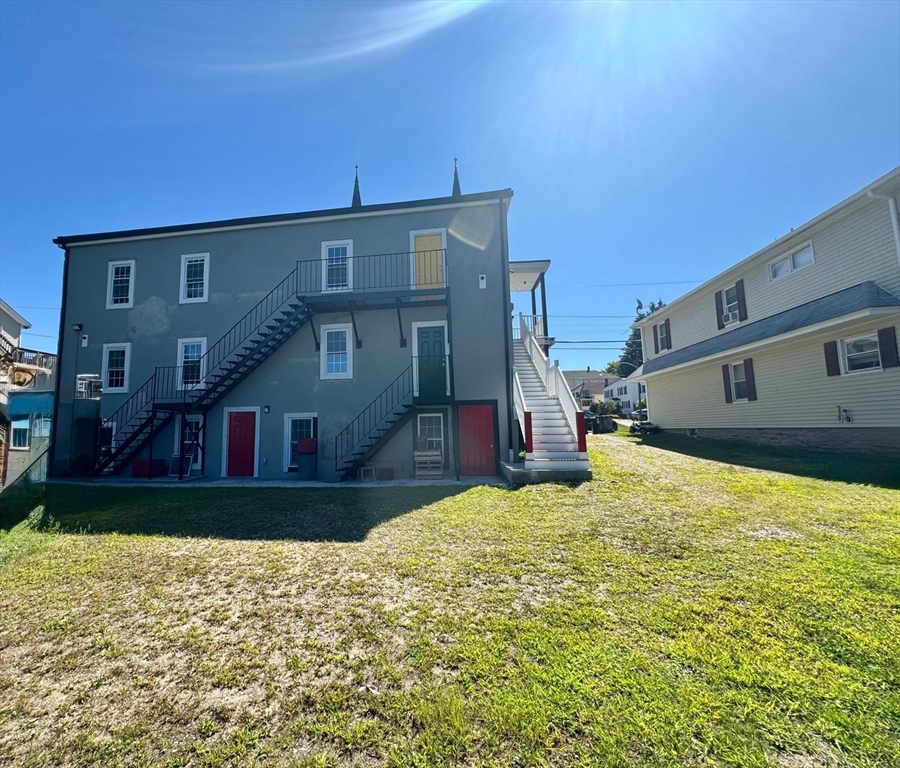 56 Whitcomb Street Webster, MA 01570 - Photo 2 of 18 a view of a house with a yard