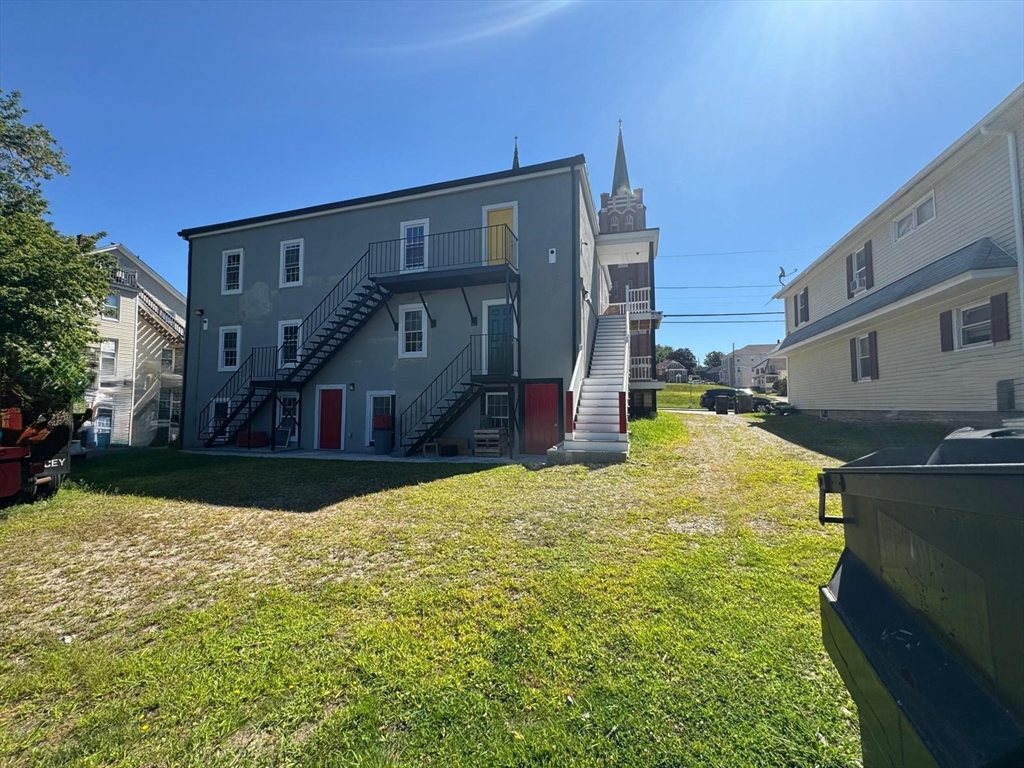 56 Whitcomb Street Webster, MA 01570 - Photo 3 of 18 a house view with a outdoor space