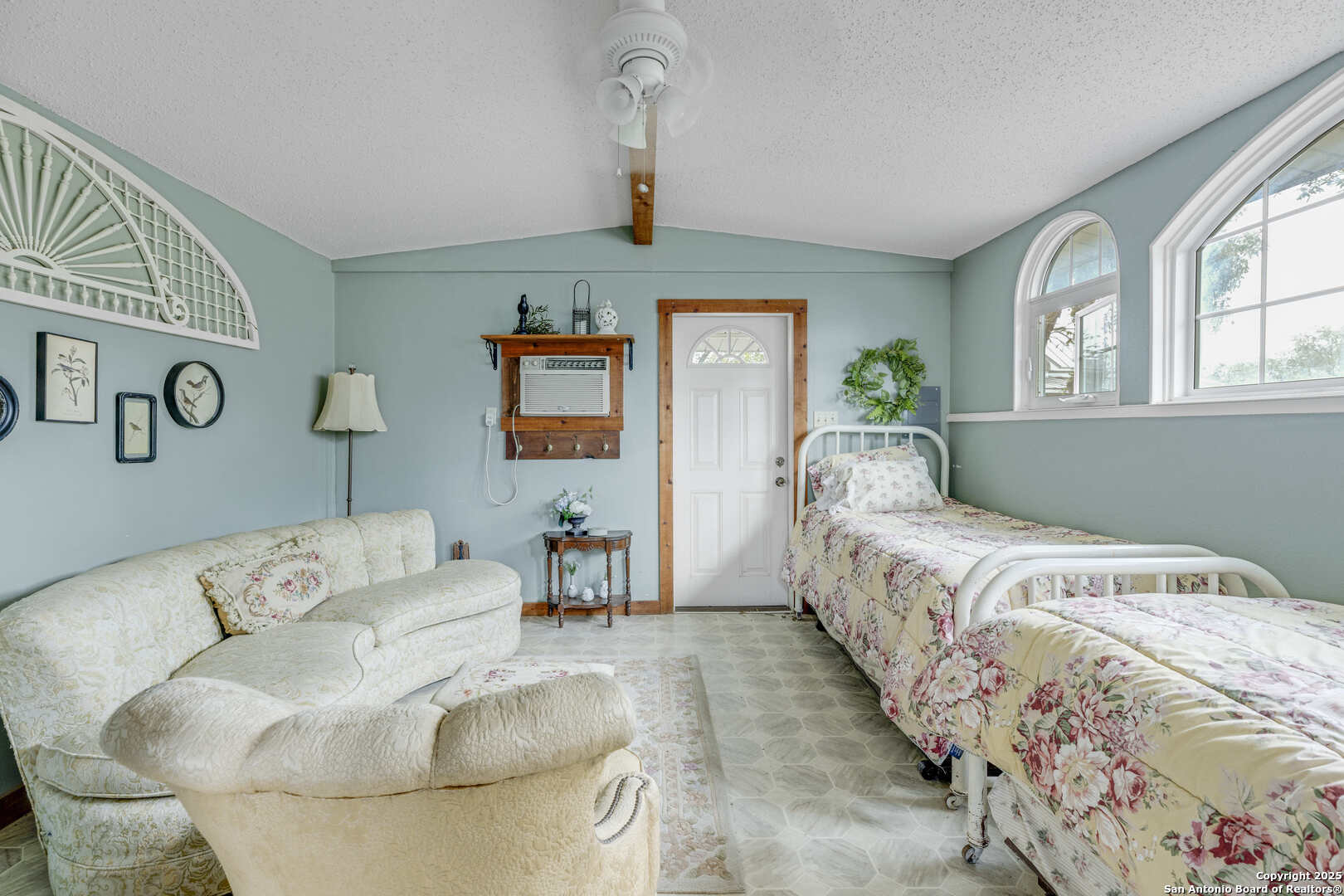 1201 10th Street Hondo, TX 78861 - Photo 42 of 46 a bed sitting in a bedroom next to a window