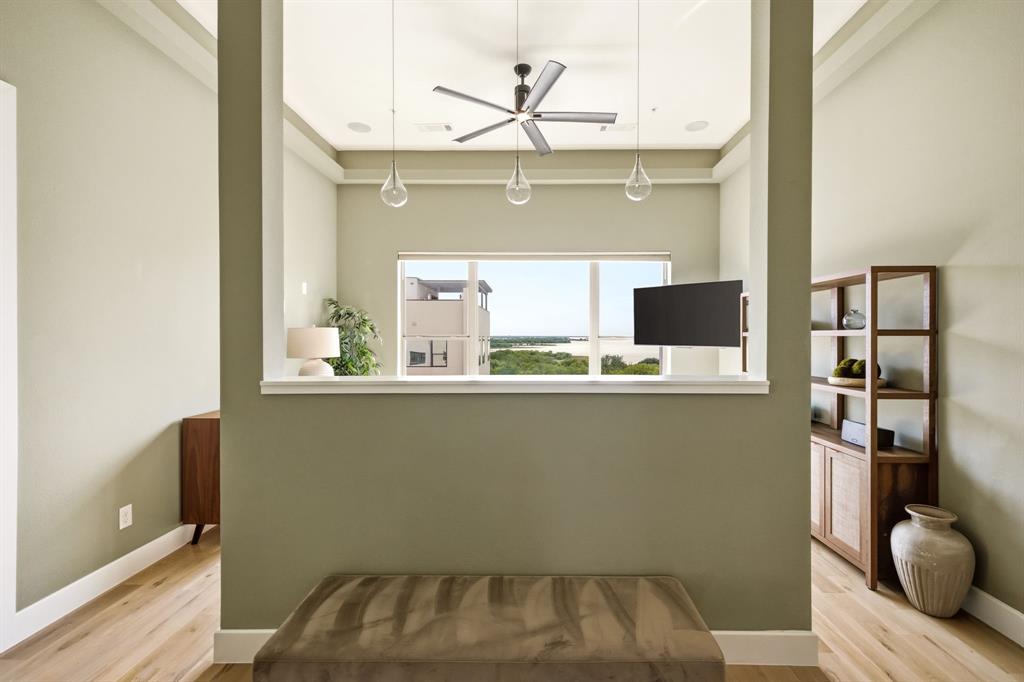 4928 Blaynes Road The Colony, TX 75056 - Photo 14 of 38 Relaxing primary suite with unobstructed water views