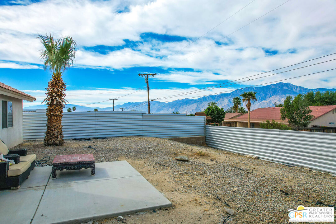 13753 Inaja Street Desert Hot Springs, CA 92240 - Photo 19 of 24 a view of a terrace with chairs