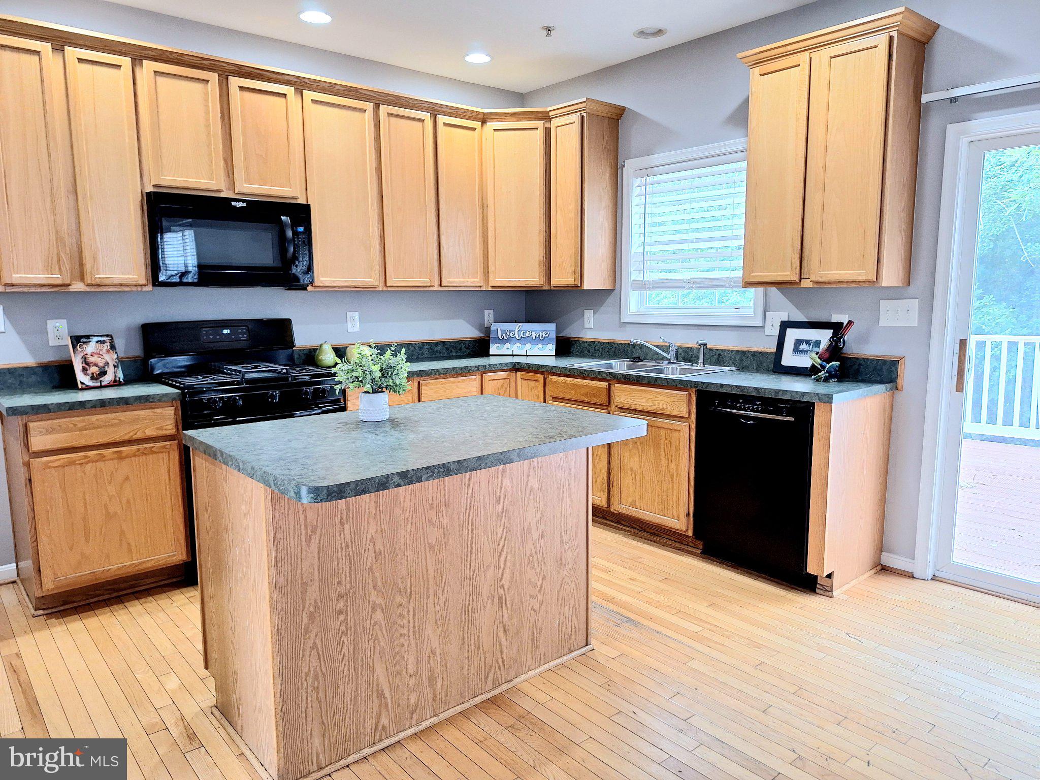 7906 Springridge Road Glen Burnie, MD 21060 - Photo 9 of 28 Bright and inviting kitchen space.