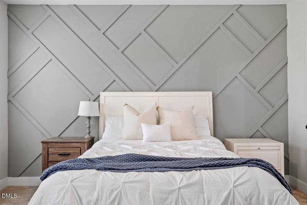 506 Dogwood Road Holly Springs, NC 27540 - Photo 22 of 42 a bedroom with a bed and a window