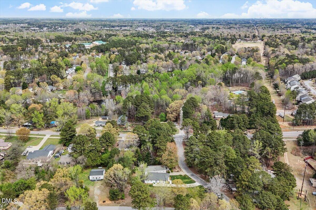 506 Dogwood Road Holly Springs, NC 27540 - Photo 39 of 42 an aerial view of a houses with a yard