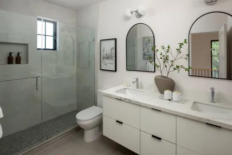 a bedroom with a bed and a table in it