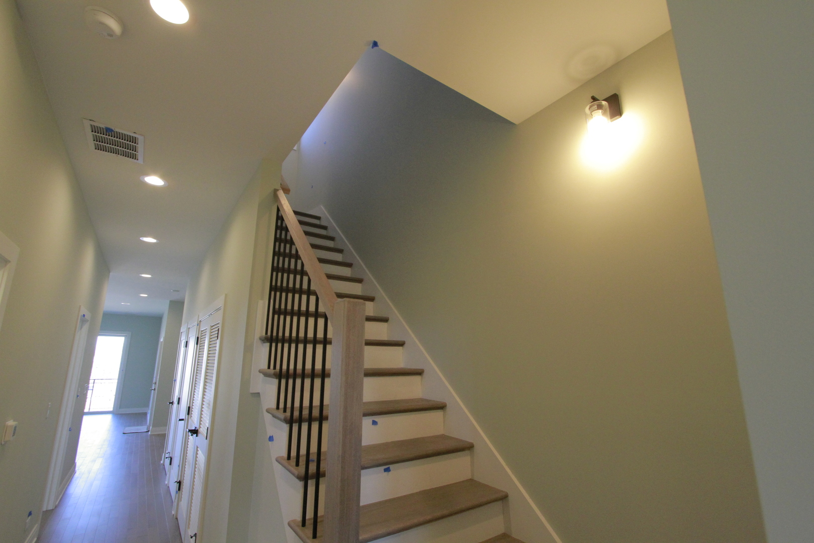 4211 West Roscoe Street, Unit 2W Chicago, IL 60641 - Photo 9 of 12 a view of entryway with wooden floor