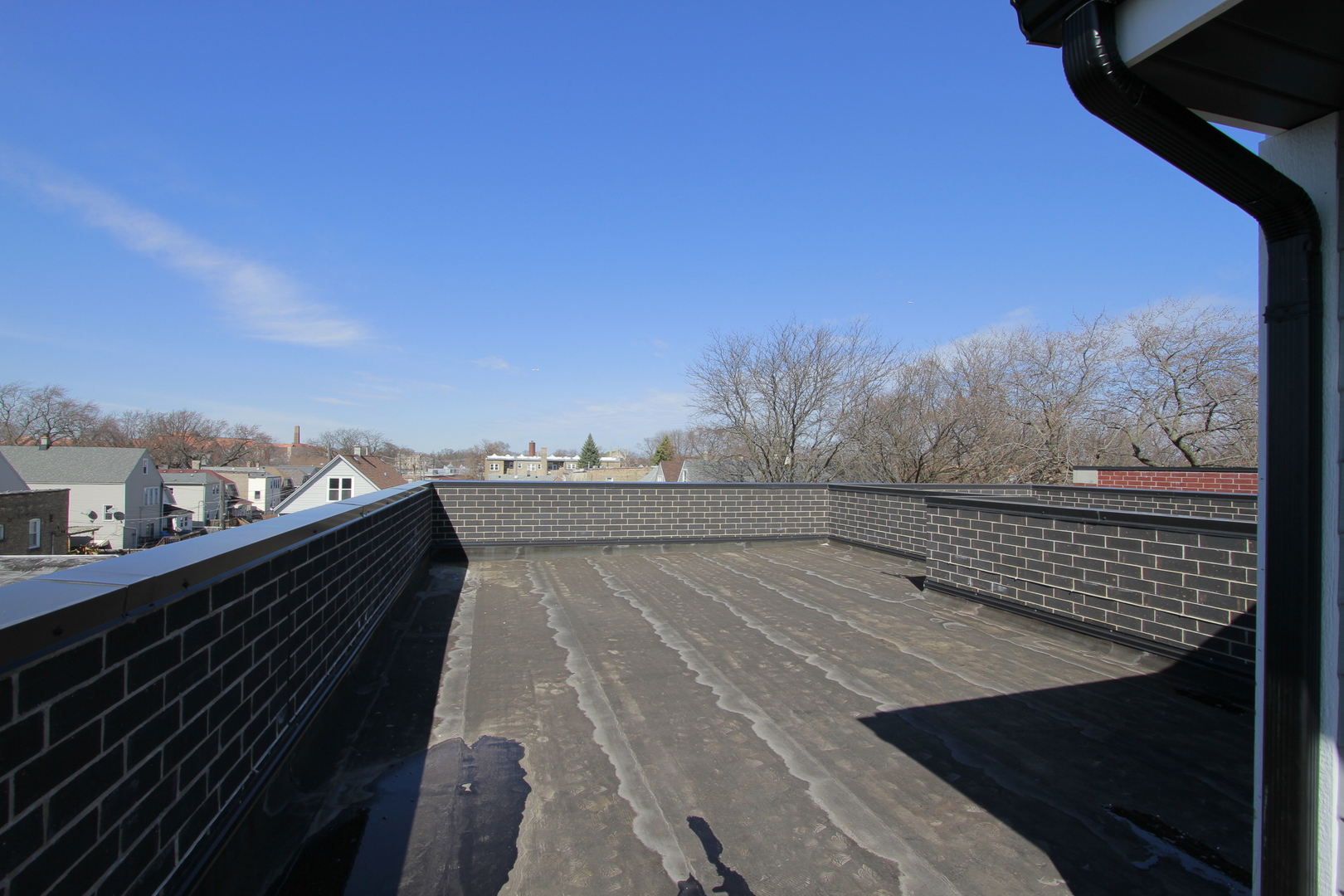 4211 West Roscoe Street, Unit 2W Chicago, IL 60641 - Photo 10 of 12 a view of balcony with furniture