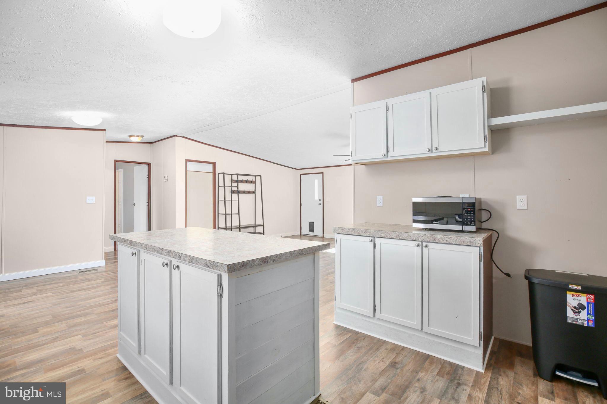 10000 Hummingbird Lane Partlow, VA 22534 - Photo 6 of 35 Bright and airy kitchen with modern finishes.