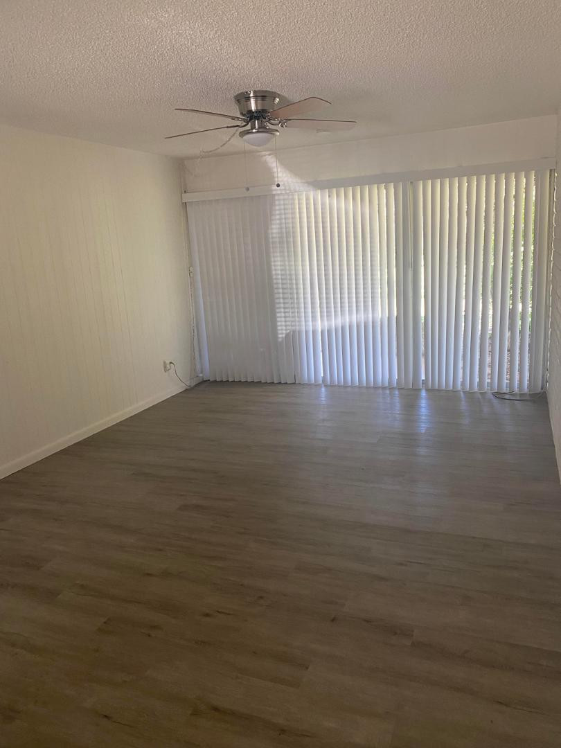 4140 East Cliffside Trail, Unit G Rimrock, AZ 86335 - Photo 12 of 25 a view of a room with wooden floor