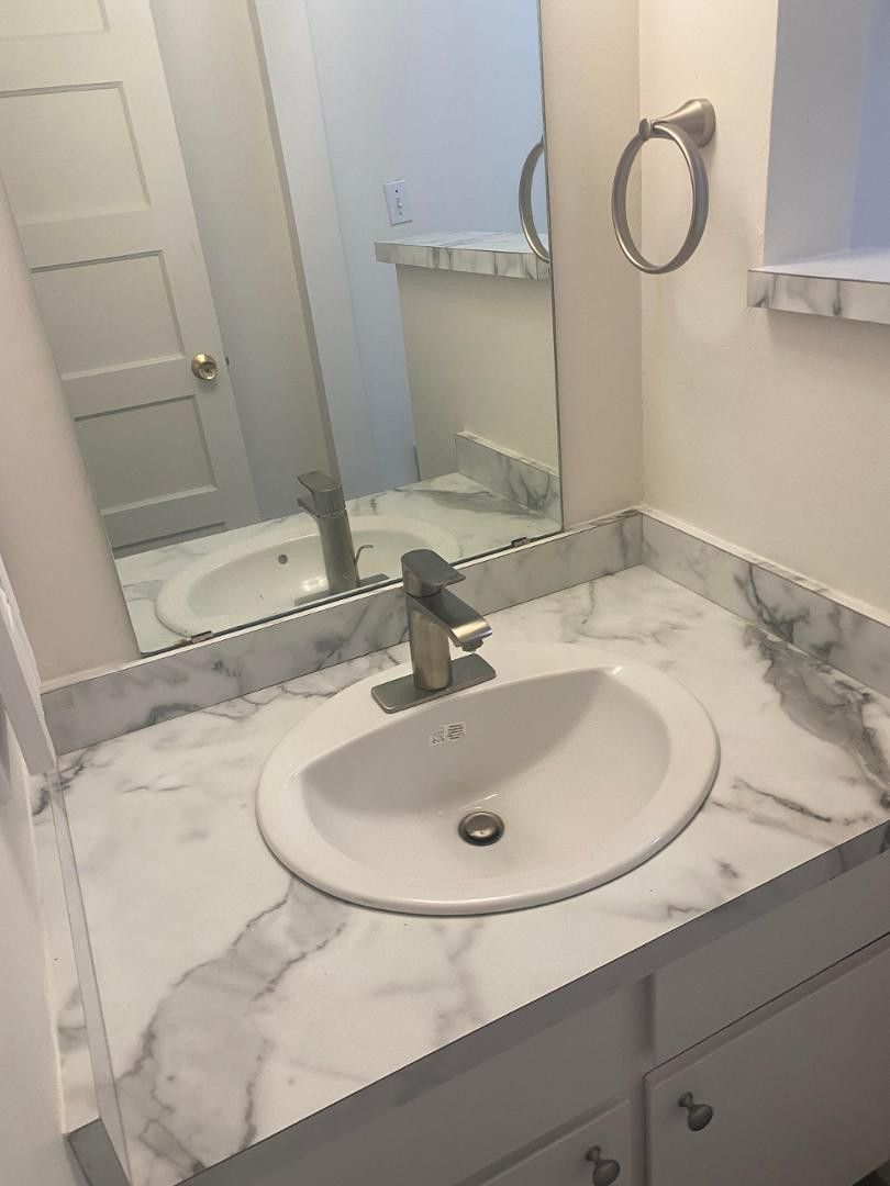 4140 East Cliffside Trail, Unit G Rimrock, AZ 86335 - Photo 3 of 25 a bathroom with a sink and a mirror