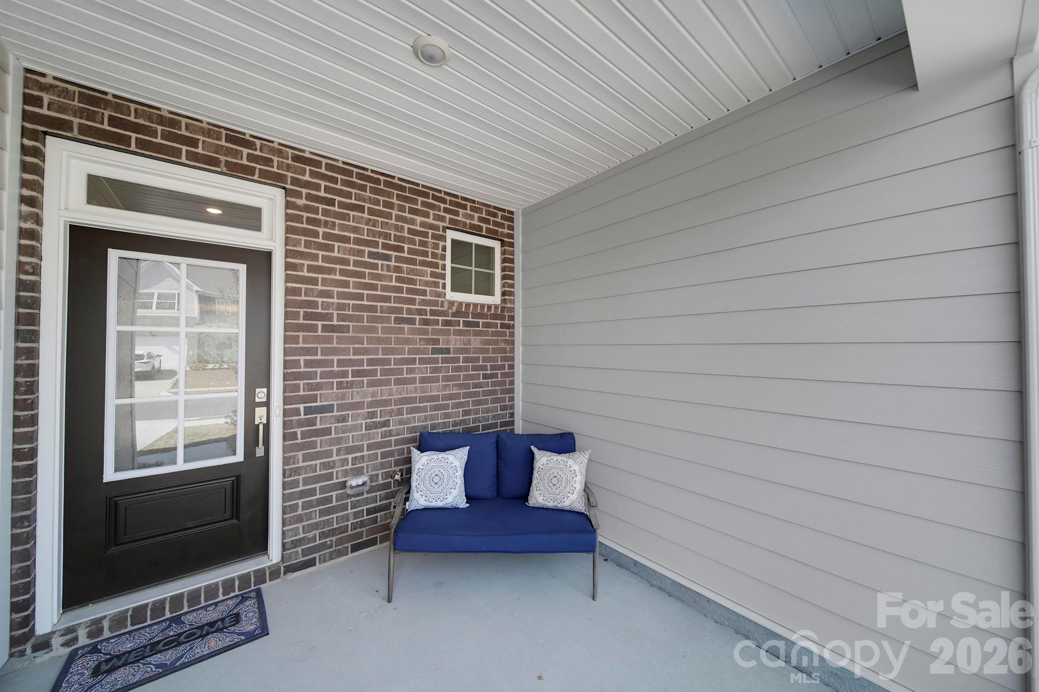 7032 Everly Commons Lane Fort Mill, SC 29708 - Photo 2 of 37 a view of a two chairs in the balcony