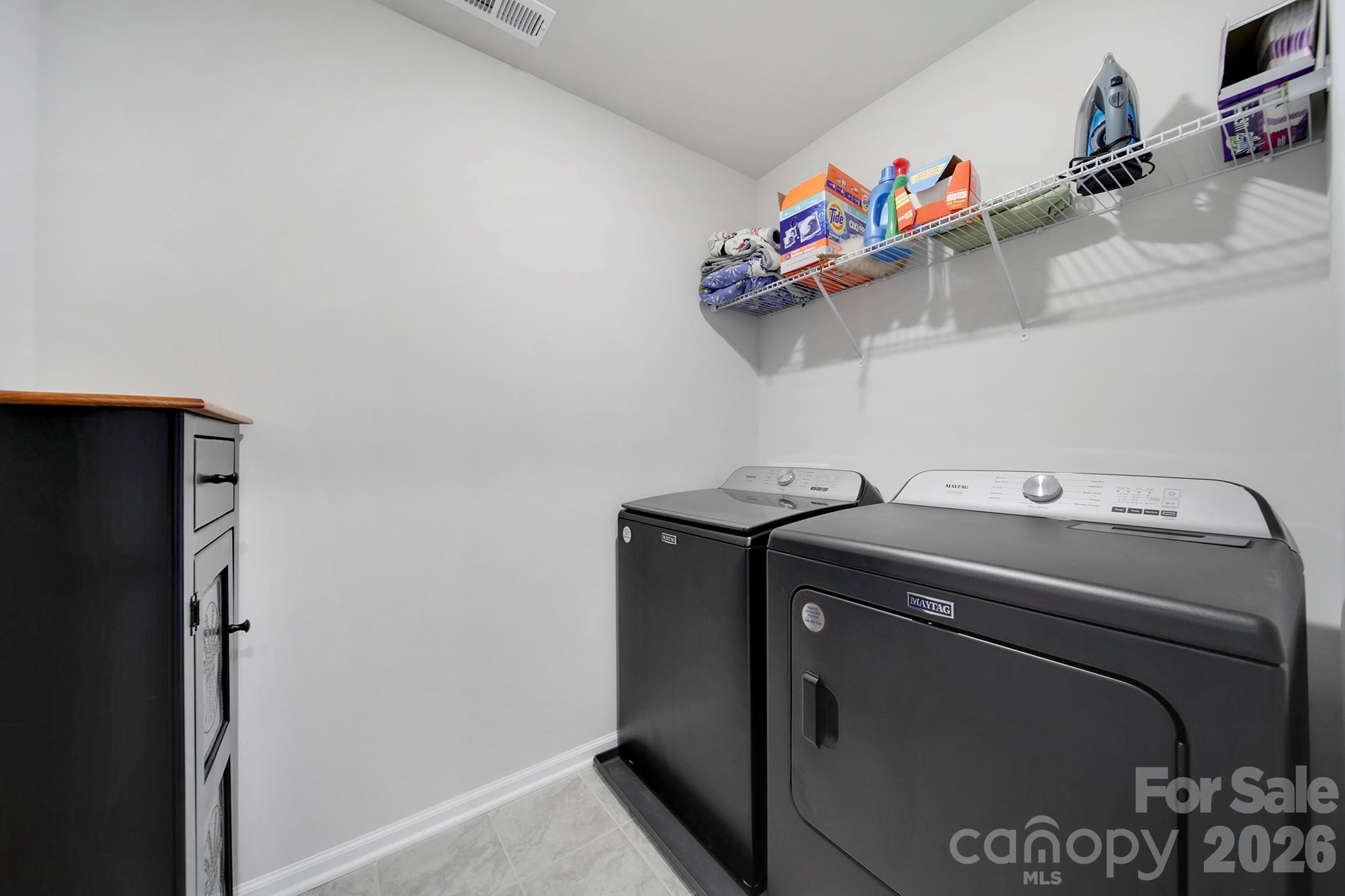 7032 Everly Commons Lane Fort Mill, SC 29708 - Photo 23 of 37 a utility room with dryer and washer