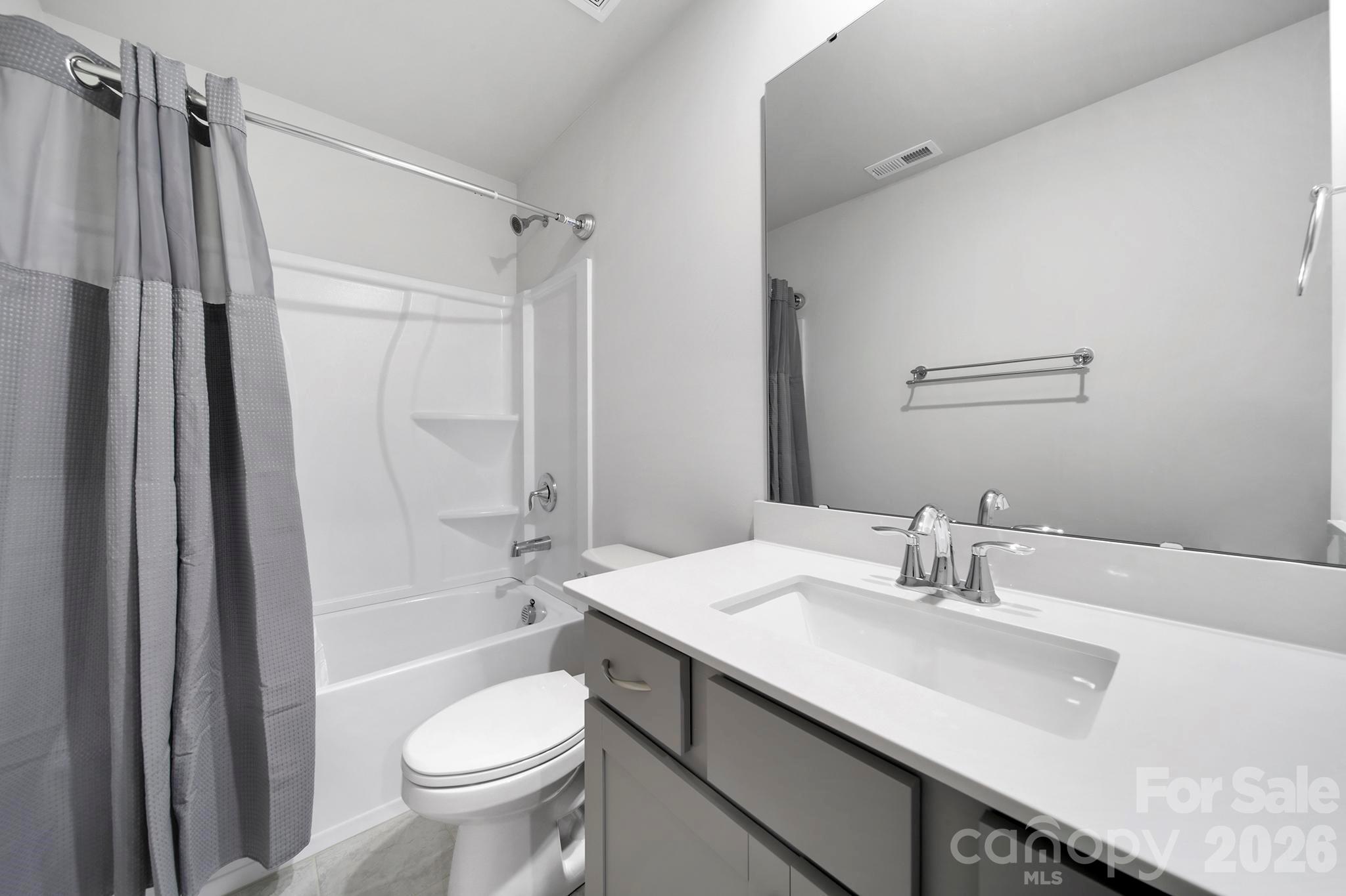 7032 Everly Commons Lane Fort Mill, SC 29708 - Photo 26 of 37 a bathroom with a sink toilet and shower