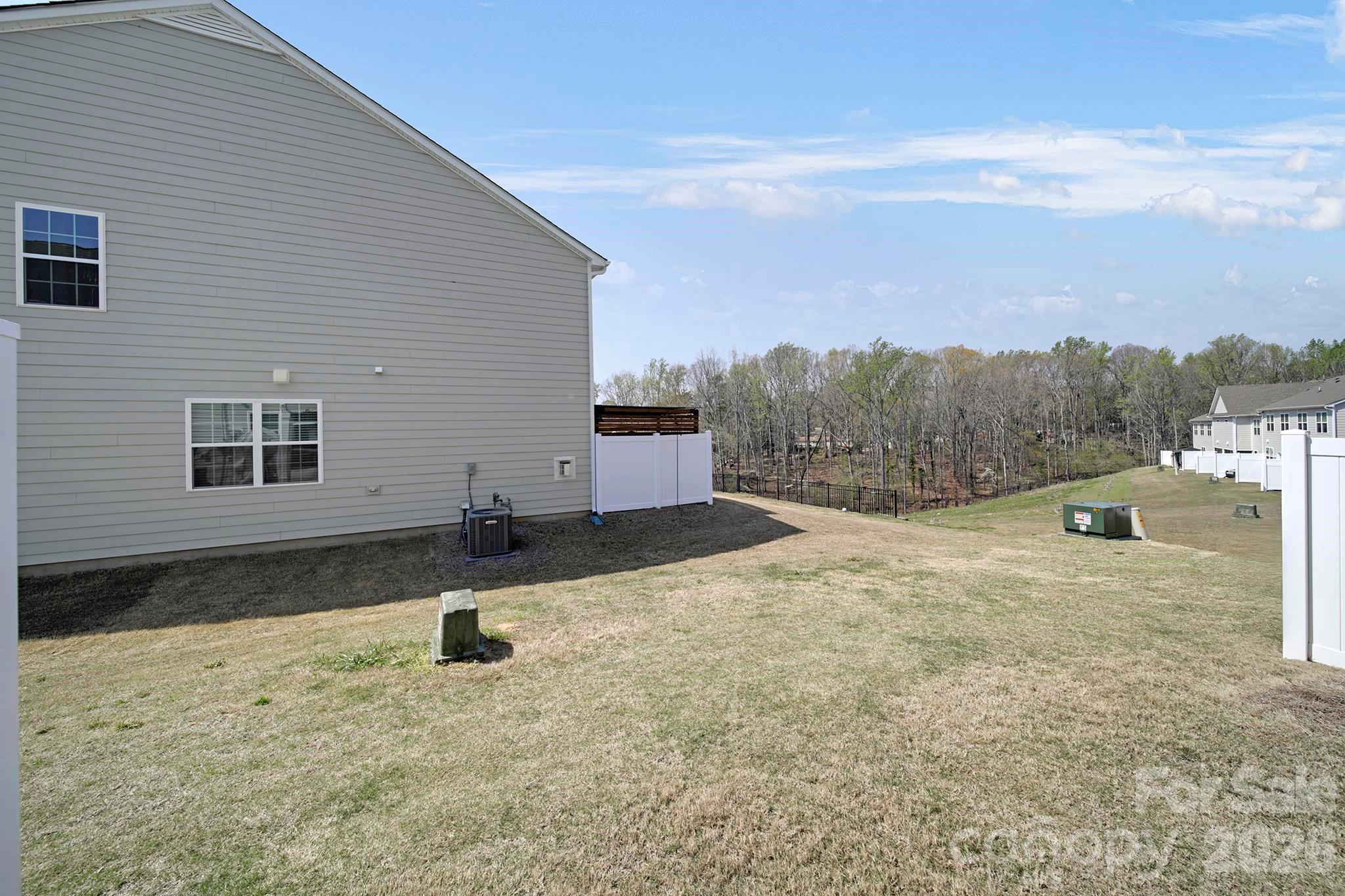 7032 Everly Commons Lane Fort Mill, SC 29708 - Photo 30 of 37 a bathroom with a sink and a stove