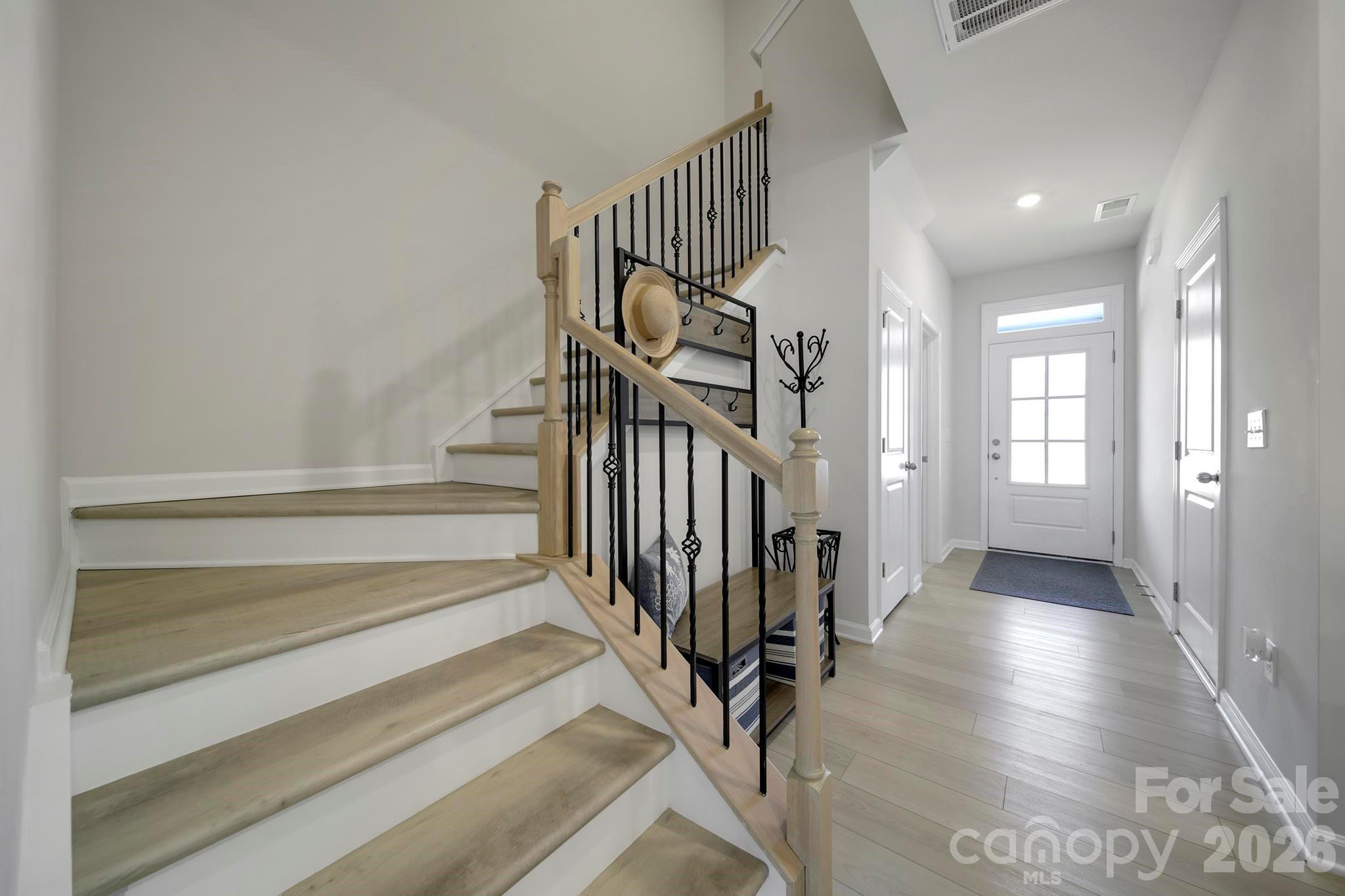 7032 Everly Commons Lane Fort Mill, SC 29708 - Photo 5 of 37 a view of an entryway with wooden floor