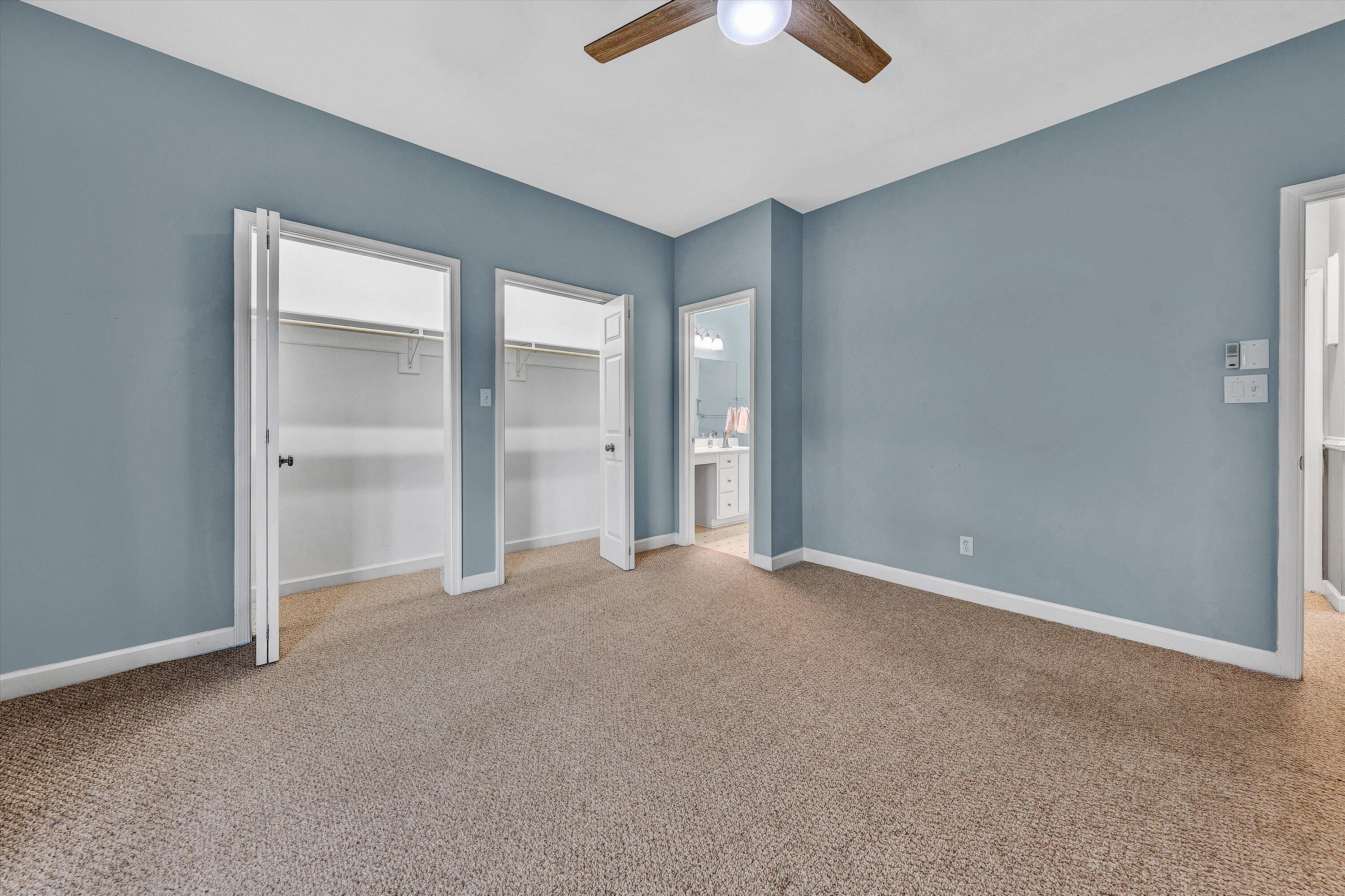2326 Lake Retreat Road Huddleston, VA 24104 - Photo 26 of 42 an empty room with chandelier fan