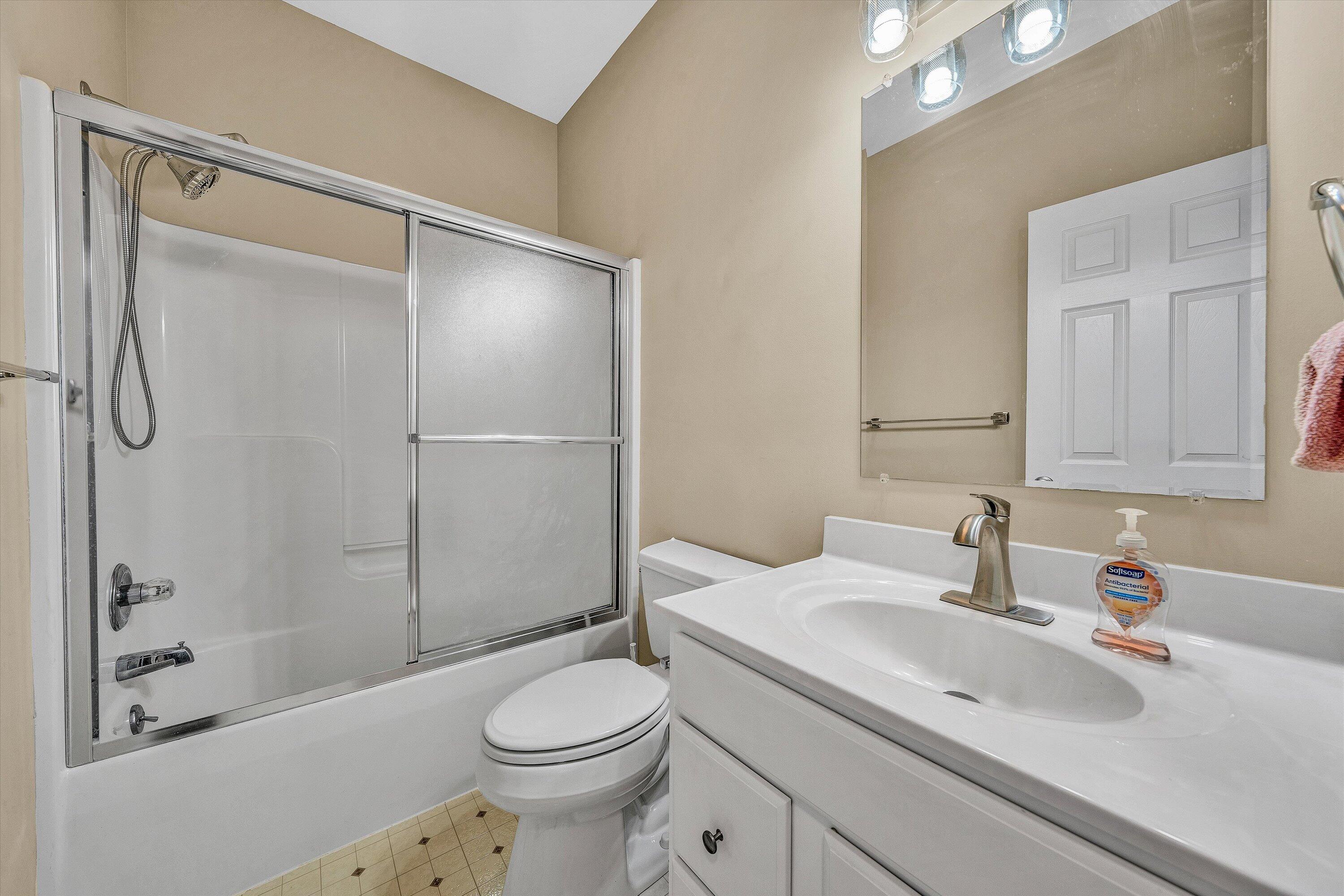 2326 Lake Retreat Road Huddleston, VA 24104 - Photo 30 of 42 a bathroom with a sink toilet and shower