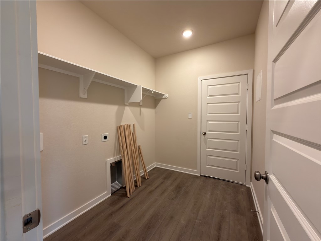 1394 Kingsgate Drive Bryan, TX 77807 - Photo 6 of 10 a view of room with hallway and wooden floor