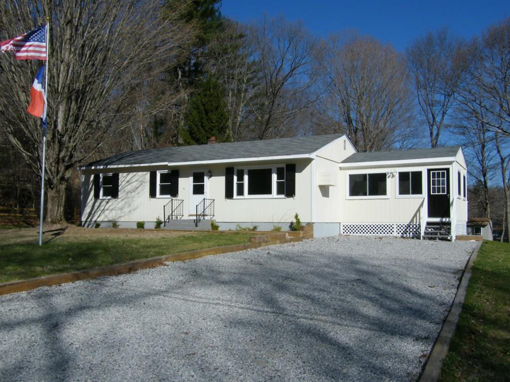 a view of a yard in front of house