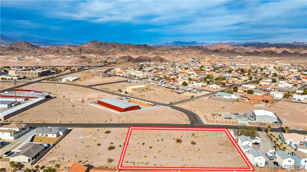3432 Sunriver Road Bullhead City, AZ 86429 - Photo 5 of 10 an aerial view of residential houses with outdoor space