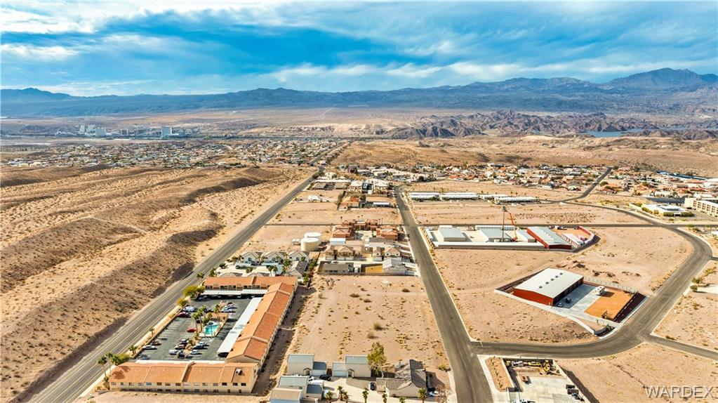 3432 Sunriver Road Bullhead City, AZ 86429 - Photo 9 of 10 an aerial view of residential houses with outdoor space