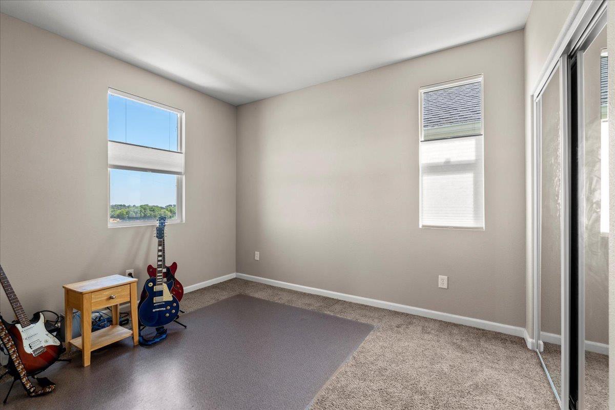 702 Annemarie Way Isleton, CA 95641 - Photo 15 of 18 a room with a window and wooden floor