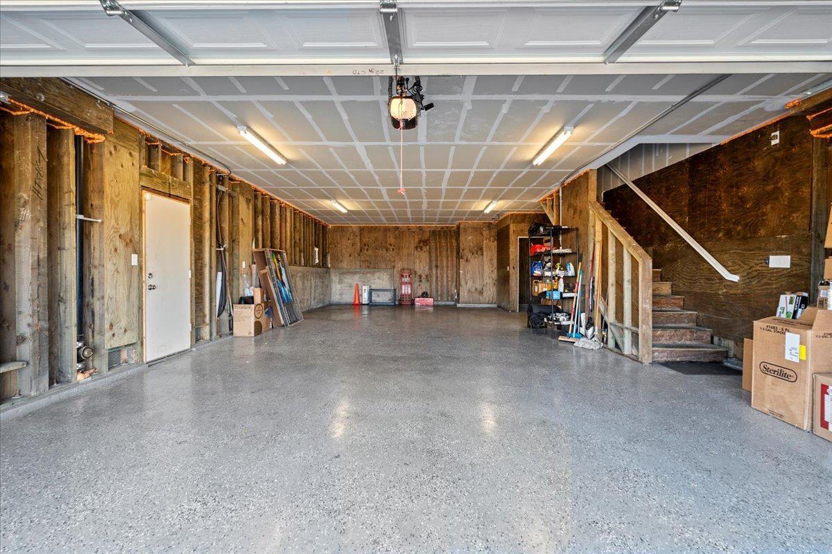 702 Annemarie Way Isleton, CA 95641 - Photo 18 of 18 a view of a hallway with stairs and chandelier