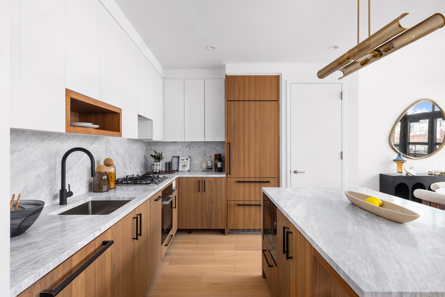 29 Huron Street, Unit 2AW Brooklyn, NY 11222 - Photo 3 of 17 a kitchen with stainless steel appliances granite countertop a sink a stove and a wooden floors