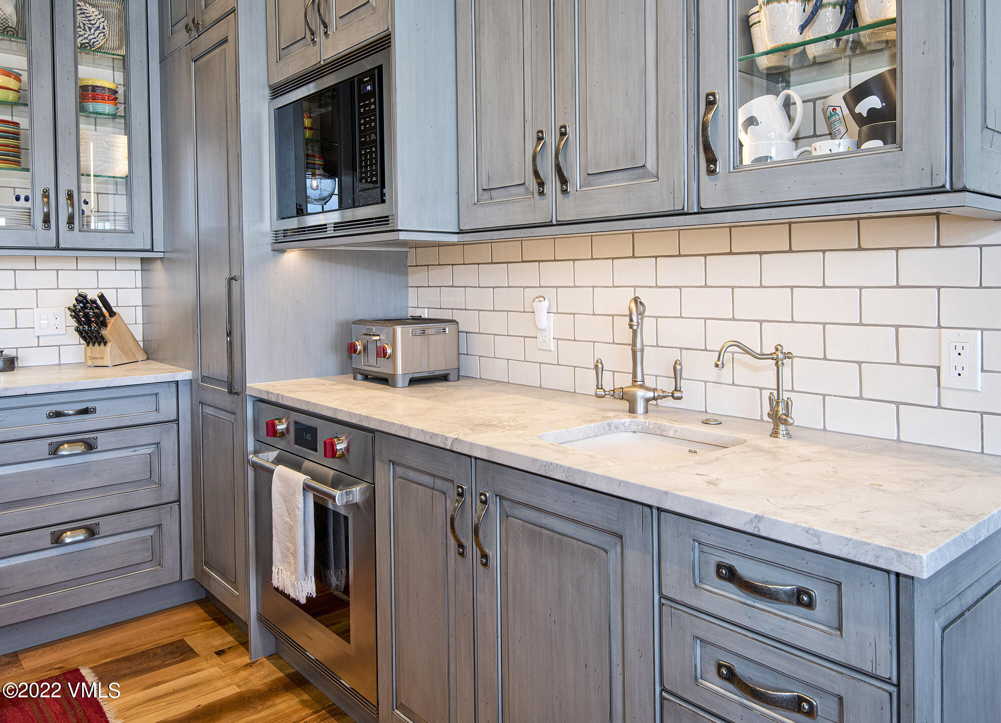1250 Bachelor Ridge Road Avon, CO 81620 - Photo 11 of 60 a kitchen with a sink and cabinets