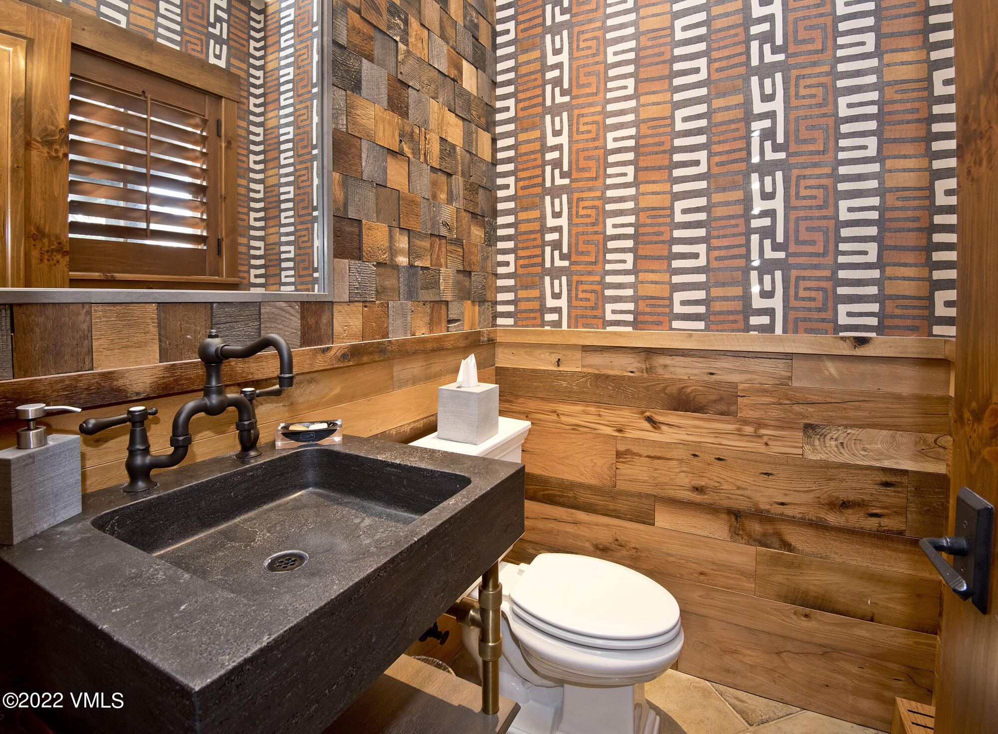 1250 Bachelor Ridge Road Avon, CO 81620 - Photo 24 of 60 a bathroom with a sink a toilet and a bathtub