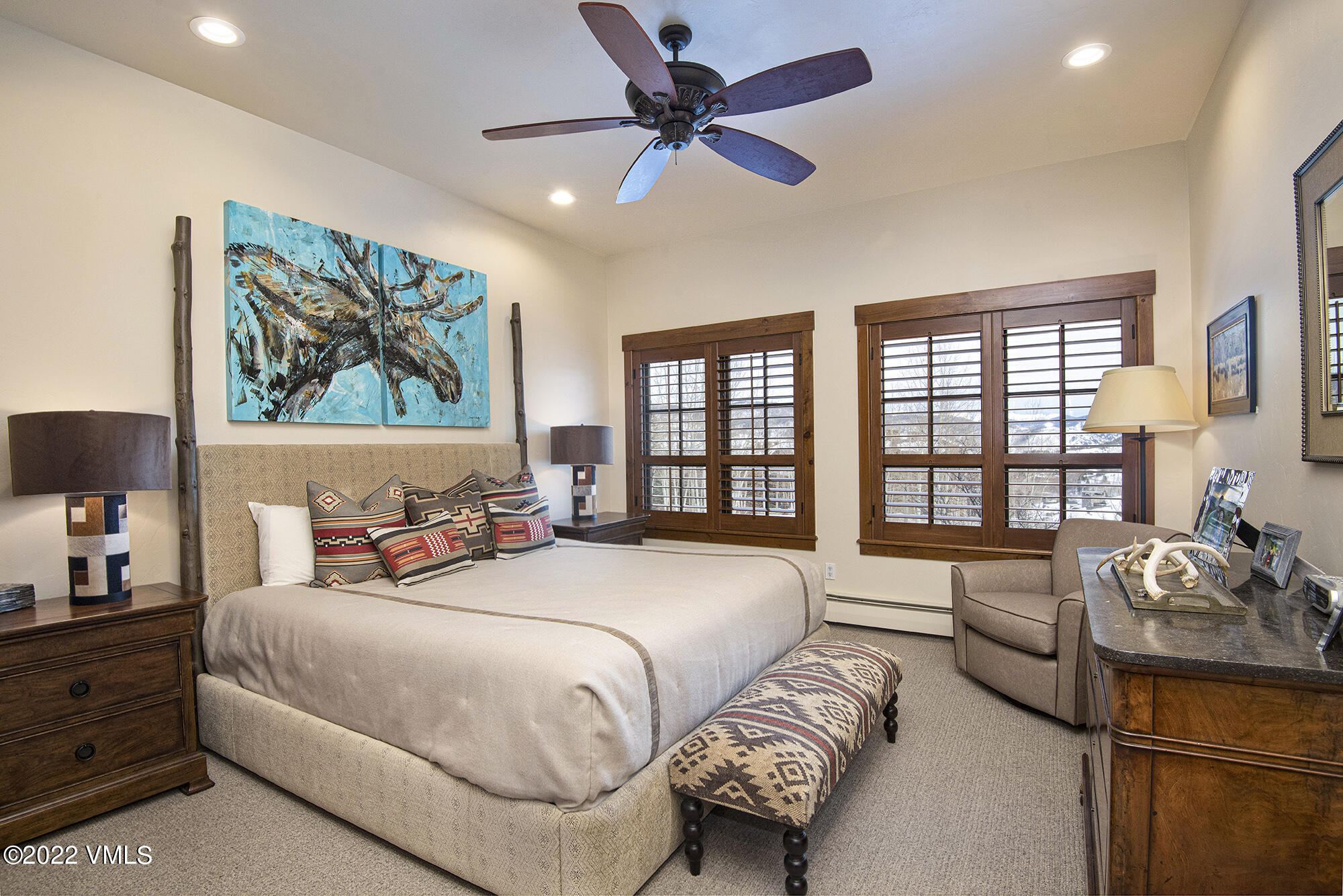 1250 Bachelor Ridge Road Avon, CO 81620 - Photo 34 of 60 a spacious bedroom with double bed and a large window