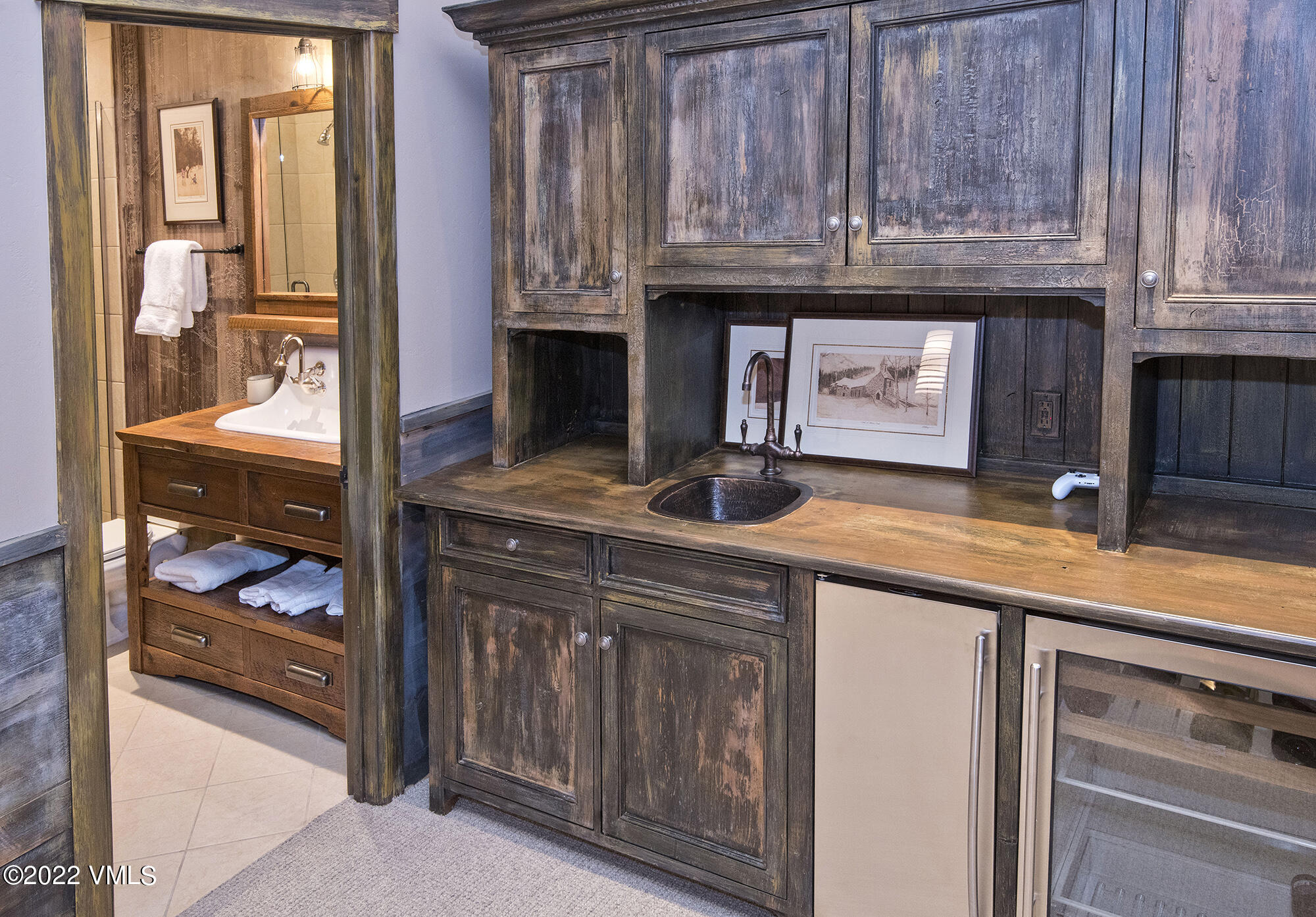 1250 Bachelor Ridge Road Avon, CO 81620 - Photo 41 of 60 a kitchen with granite countertop a sink and cabinets