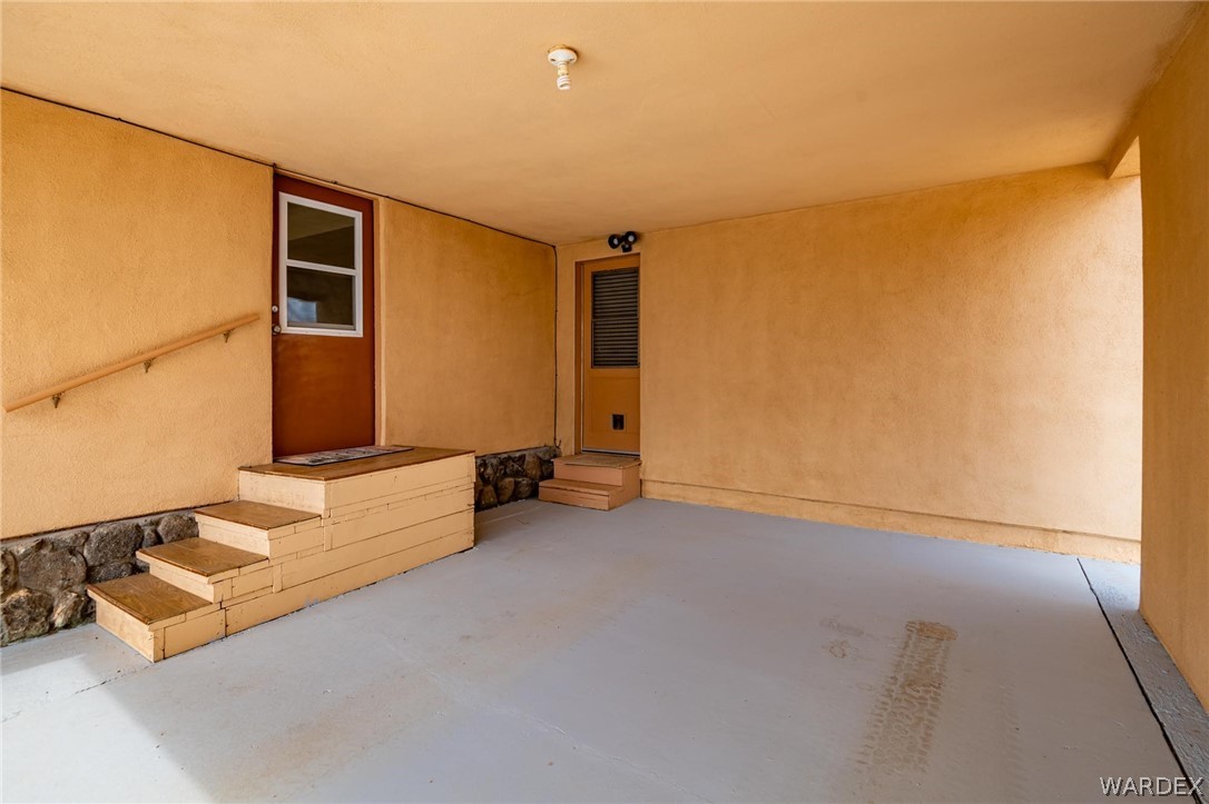 3341 Marana Road Golden Valley, AZ 86413 - Photo 38 of 46 an empty room with windows
