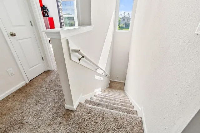 a view of a hallway with workspace