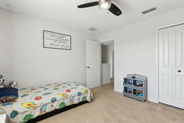 an aerial view of a house with a garden