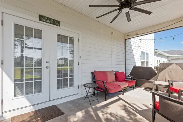 an aerial view of residential houses with outdoor space