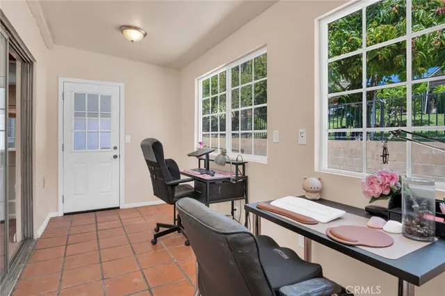a living room with furniture and window