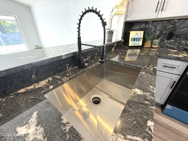 a bathroom with a toilet a sink and a bathtub