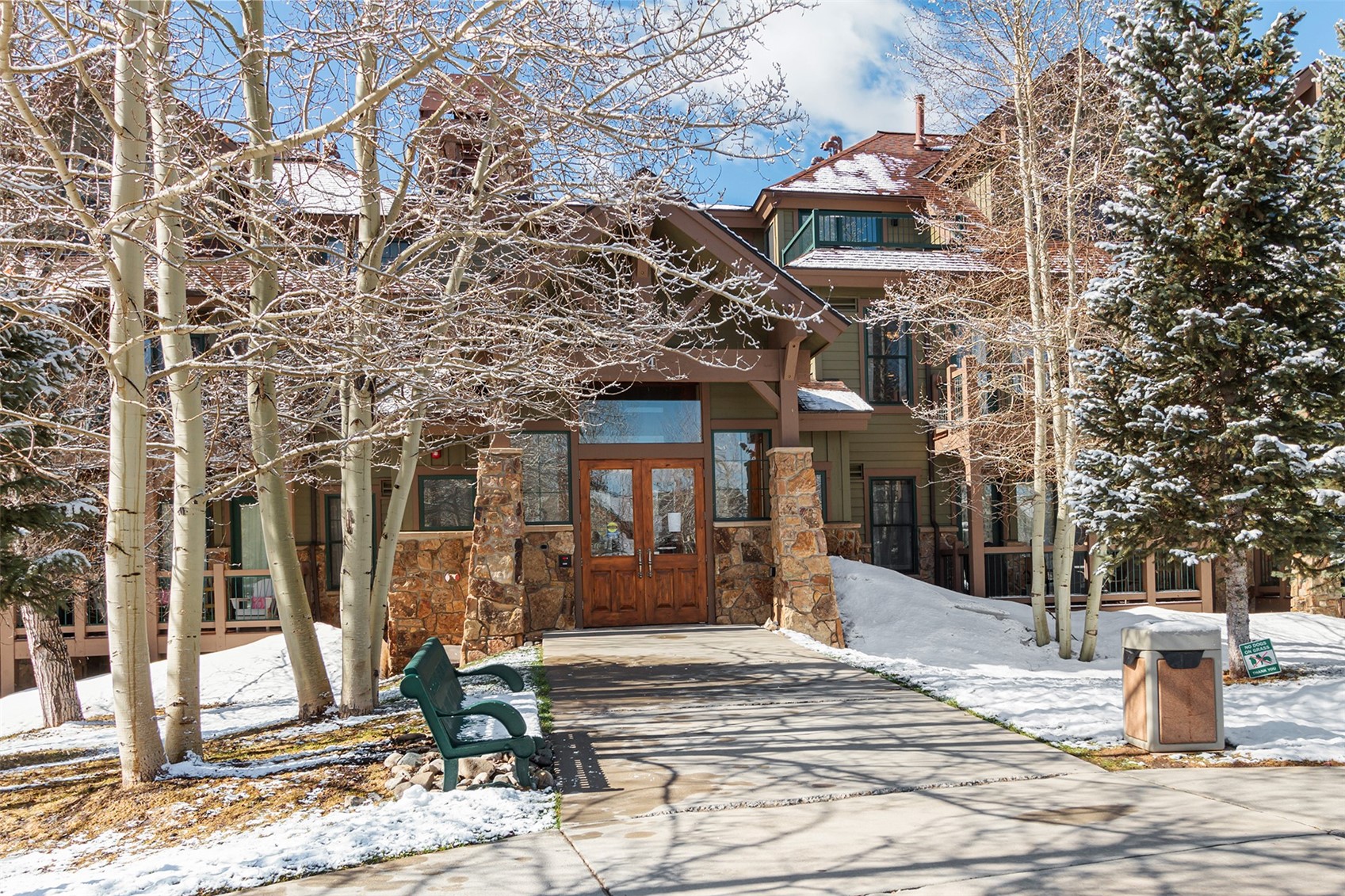 34 Highfield Trail, Unit 404 Breckenridge, CO 80424 - Photo 19 of 25 a front view of a building with street view