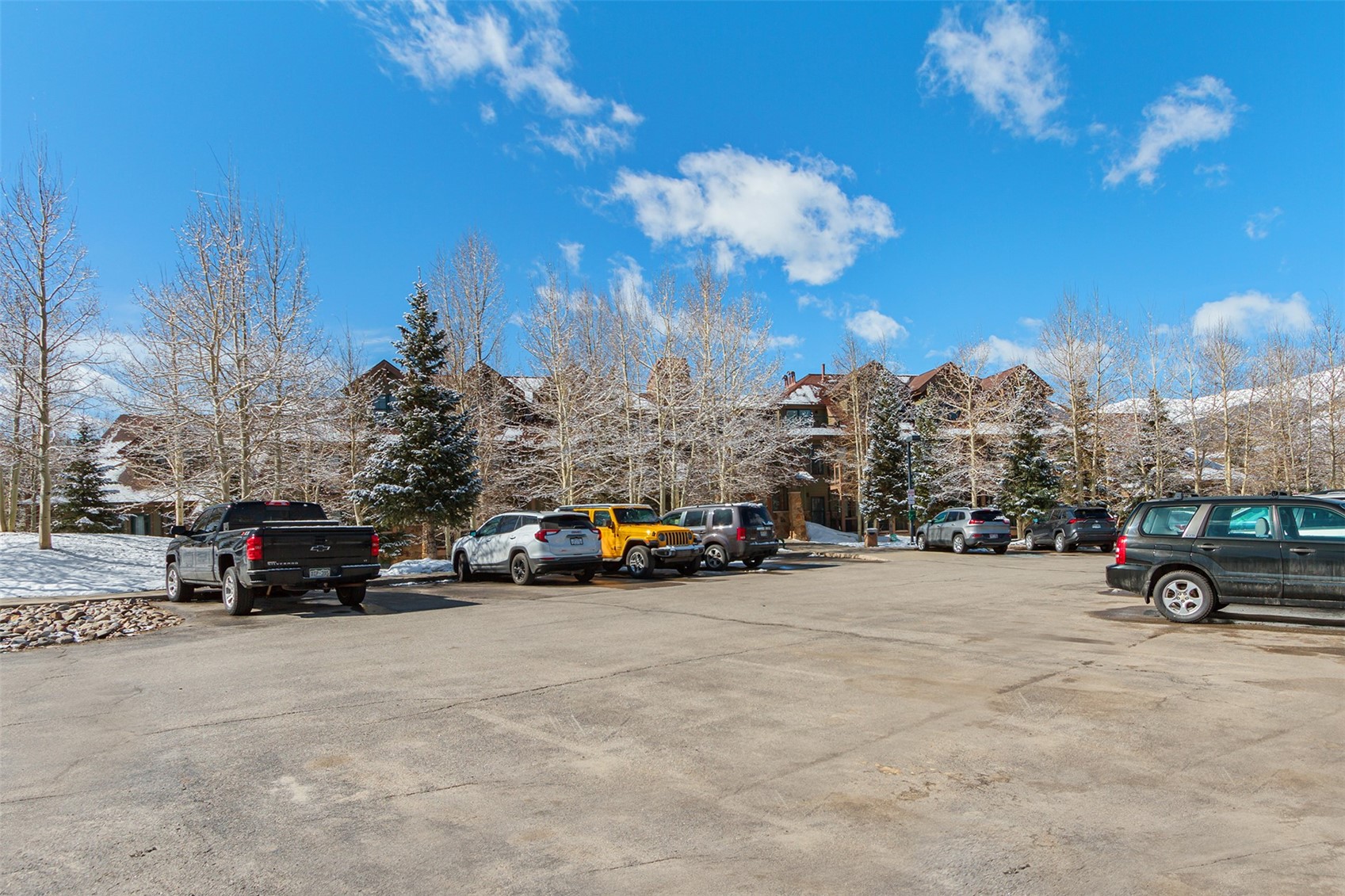 34 Highfield Trail, Unit 404 Breckenridge, CO 80424 - Photo 25 of 25 a car parked on the side of the road