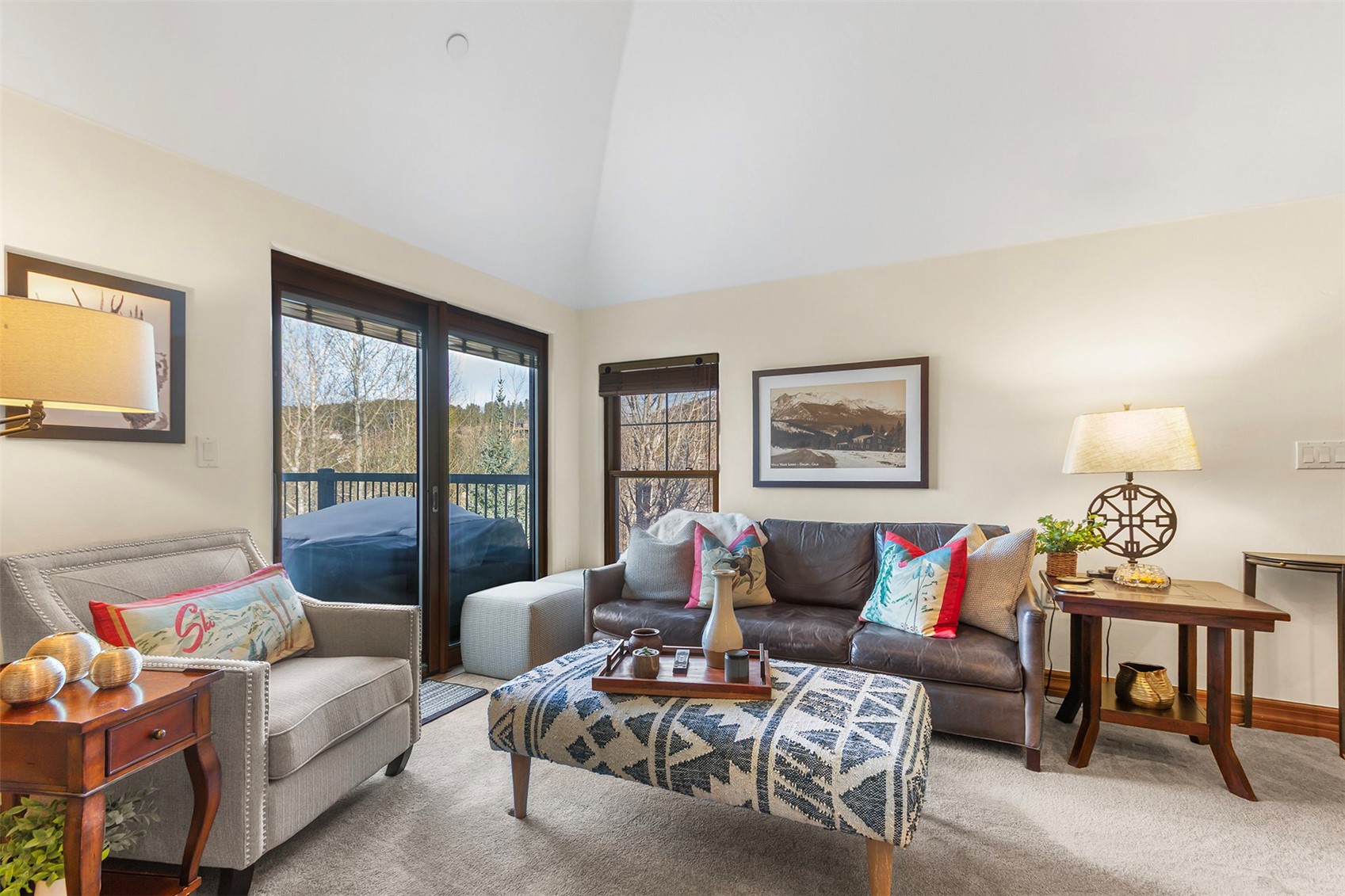 34 Highfield Trail, Unit 404 Breckenridge, CO 80424 - Photo 6 of 25 a living room with furniture and a window
