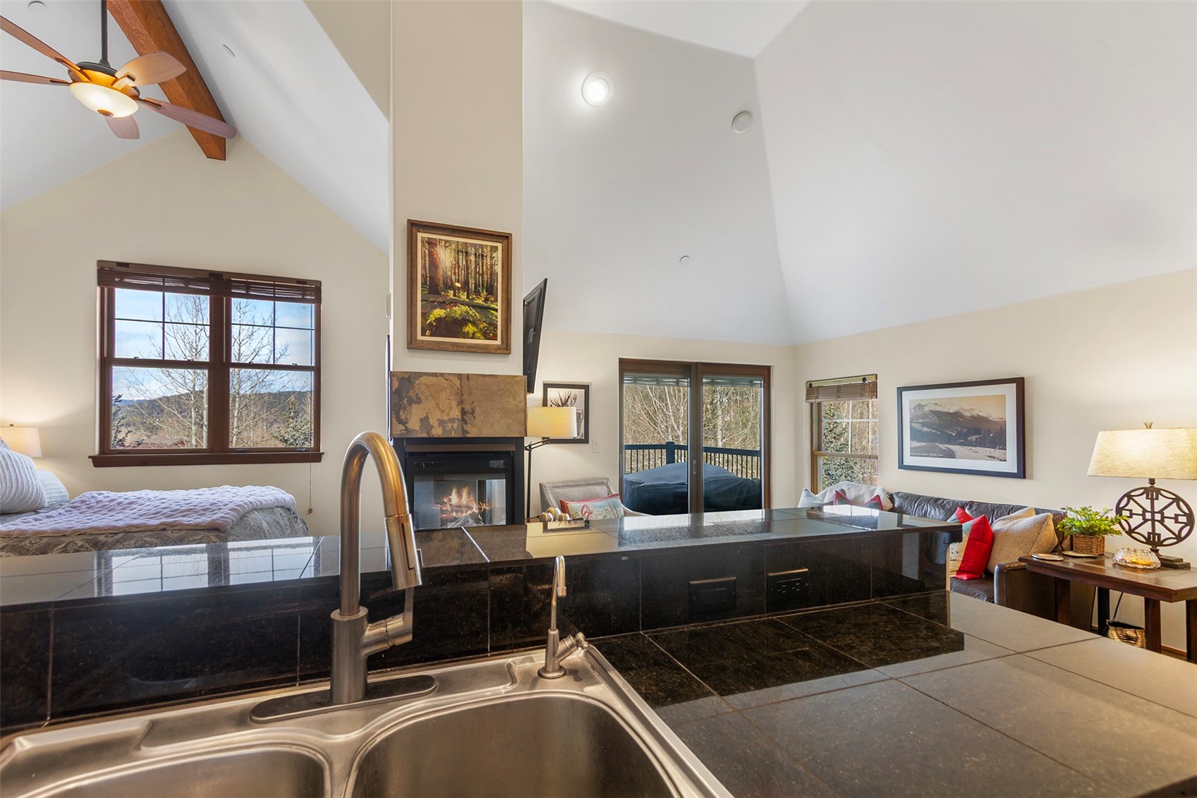 34 Highfield Trail, Unit 404 Breckenridge, CO 80424 - Photo 9 of 25 a living room with furniture window and fireplace